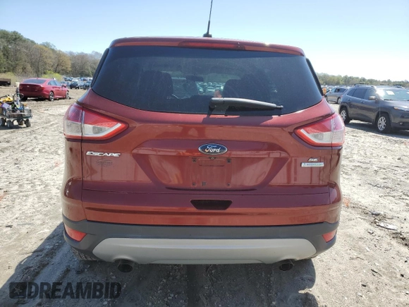 2015 Ford Escape SE with VIN 1FMCU0GX7FUC41765, listed as a Copart auction lot 52142305 with 79,684 mi miles and Salvage Title. Bid and sale history available at DreamBid. Image 6.