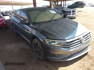 2021 Volkswagen Jetta SEL Premium z VIN 3VWG57BU7MM001297, wystawiony jako IAAI lot #41990574 z przebiegiem 48 521 mil mil oraz . Historia ofert i sprzedaży dostępna na DreamBid. Obrazek 1.