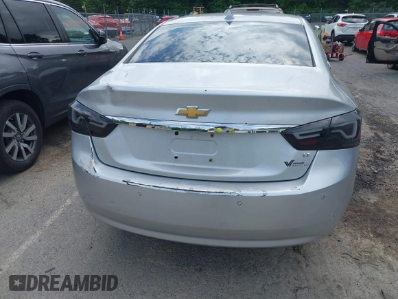 2014 Chevrolet Impala LT with VIN 2G1115SL4E9279660, listed as a IAAI auction lot 42675495 with 159,215 mi miles and . Bid and sale history available at DreamBid. Image 20.