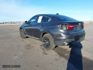 2015 BMW X6 xDrive35i with VIN 5UXKU2C50F0N77926, listed as a IAAI auction lot 41681268 with 136,118 mi miles. Bid and sale history available at carsss.com. Image 3.