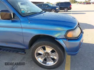 2003 Mitsubishi Montero XLS z VIN JA4MT31R13J045223, wystawiony jako IAAI lot #42208271 z przebiegiem 188 068 mil mil oraz . Historia ofert i sprzedaży dostępna na DreamBid. Obrazek 6.