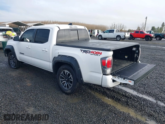 2021 Toyota Tacoma SR z VIN 3TMCZ5AN2MM426723, wystawiony jako IAAI lot #41604033 z przebiegiem 46 522 mil mil oraz . Historia ofert i sprzedaży dostępna na DreamBid. Obrazek 3.