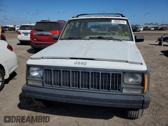1993 Jeep Cherokee Sport с VIN 1J4FJ68S4PL555701, выставлен на аукционе Copart как лот 76020714 с пробегом 130 884 миль миль и Списание • Salvage title. История ставок и продаж доступна на DreamBid. Изображение 5.