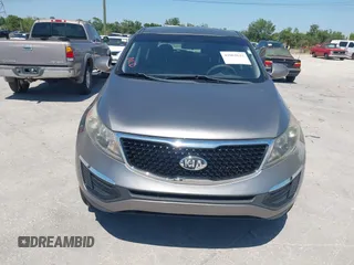 2014 Kia Sportage LX with VIN KNDPB3AC7E7595527, listed as a IAAI auction lot 42062615 with 64,777 mi miles. Bid and sale history available at carsss.com. Image 6.