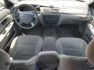 2006 Ford Taurus SE with VIN 1FAFP53U96A104173, listed as a Copart auction lot 59624865 with 145,005 mi miles and Salvage title. Bid and sale history available at DreamBid. Image 8.
