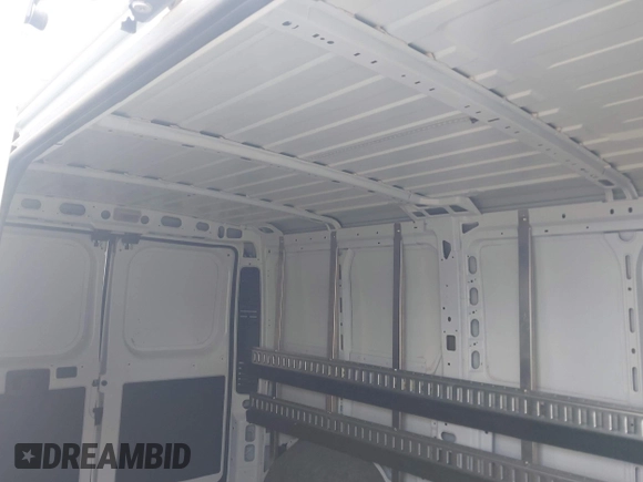 2023 Ram ProMaster Cargo with VIN 3C6LRVVG2PE596243, listed as a IAAI auction lot 42069331 with 9,332 mi miles and . Bid and sale history available at DreamBid. Image 8.