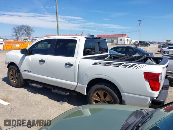 2024 Nissan Titan Pro-4X with VIN 1N6AA1EDXRN113731, listed as a IAAI auction lot 41821782 with 986 mi miles and . Bid and sale history available at DreamBid. Image 15.