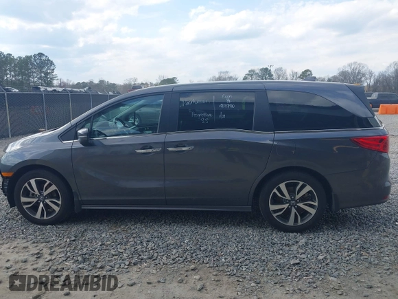 2023 Honda Odyssey Touring with VIN 5FNRL6H86PB065670, listed as a IAAI auction lot 41691093 with 22,518 mi miles and . Bid and sale history available at DreamBid. Image 15.