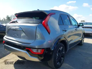 2024 Kia Niro Wind with VIN KNDCR3L11R5122388, listed as a IAAI auction lot 42261311 with 32,475 mi miles and . Bid and sale history available at DreamBid. Image 4.