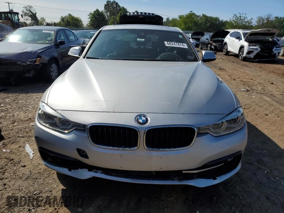 2018 BMW 3 Series with VIN WBA8F1C59JK898499, listed as a Copart auction lot 68247874 with 107,189 mi miles and Salvage title. Bid and sale history available at DreamBid. Image 5.