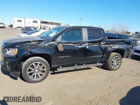 2021 GMC Canyon 4WD Denali z VIN 1GTG6EEN9M1240596, wystawiony jako IAAI lot #40760124 z przebiegiem 52 985 mil mil oraz . Historia ofert i sprzedaży dostępna na DreamBid. Obrazek 14.