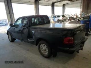 2002 Ford F-150 XL with VIN 2FTRX07W72CA71544, listed as a Copart auction lot 81628694 with 313,663 mi miles and Salvage title. Bid and sale history available at DreamBid. Image 2.