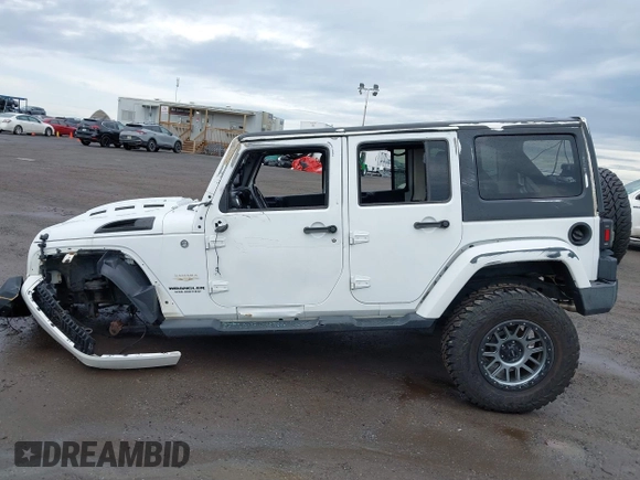 2015 Jeep Wrangler Unlimited Sahara with VIN 1C4BJWEG5FL518191, listed as a IAAI auction lot 41914581 with 107,433 mi miles. Bid and sale history available at carsss.com. Image 14.