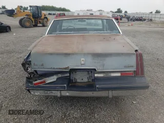 1983 Oldsmobile Cutlass Supreme z VIN 1G3AR47A1DM520447, wystawiony jako Copart lot #58216235 z przebiegiem 88 361 mil mil oraz Szkoda całkowita • Salvage title. Historia ofert i sprzedaży dostępna na DreamBid. Obrazek 6.