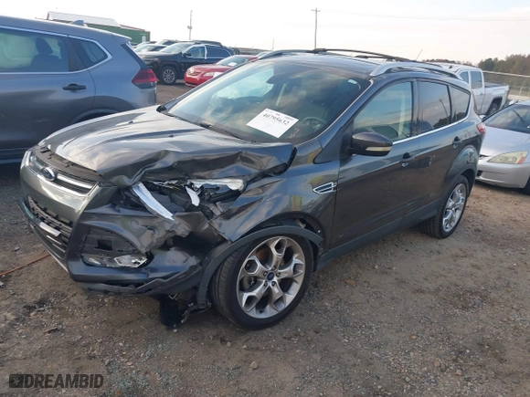2015 Ford Escape Titanium with VIN 1FMCU0J97FUC20215, listed as a IAAI auction lot 40795632 with 136,331 mi miles. Bid and sale history available at carsss.com. Image 17.