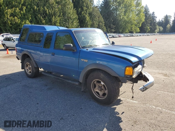 2002 Ford Ranger XLT Off-Road with VIN 1FTZR45U02PA35583, listed as a Copart auction lot 55477815 with 194,401 mi miles and Salvage title. Bid and sale history available at DreamBid. Image 4.