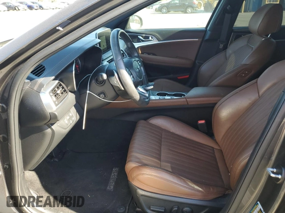 2021 Genesis G70 2.0T with VIN KMTG34LA4MU077004, listed as a Copart auction lot 71836194 with 51,624 mi miles and Salvage title. Bid and sale history available at DreamBid. Image 7.