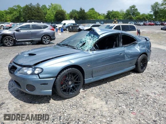 2005 Pontiac GTO z VIN 6G2VX12UX5L352121, wystawiony jako Copart lot #56840425 z przebiegiem 42 265 mil mil oraz Szkoda całkowita • Salvage title. Historia ofert i sprzedaży dostępna na DreamBid. Obrazek 1.