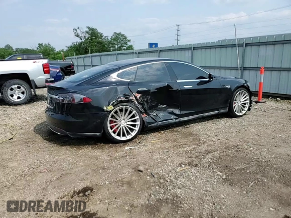 2014 Tesla Model S 60 with VIN 5YJSA1H11EFP36611, listed as a Copart auction lot 59544085 with 97,214 mi miles and Salvage title. Bid and sale history available at DreamBid. Image 13.