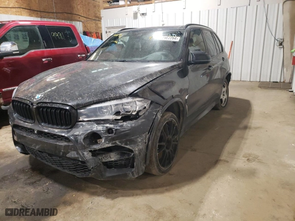 2015 BMW X5 M with VIN 5YMKT6C58F0C89657, listed as a Copart auction lot 77462264 with 110,706 mi miles and Clean Title. Bid and sale history available at carsss.com. Image 1.