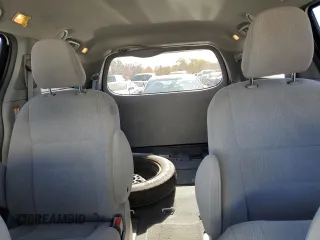 2019 Toyota Sienna L with VIN 5TDZZ3DC6KS995130, listed as a Copart auction lot 77712554 with 71,057 mi miles and Salvage Title. Bid and sale history available at carsss.com. Image 10.