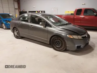 2009 Honda Civic LX z VIN 2HGFA16559H356342, wystawiony jako IAAI lot #42253404 z przebiegiem 140 175 mil mil oraz . Historia ofert i sprzedaży dostępna na DreamBid. Obrazek 1.