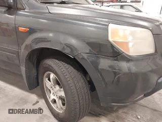 2006 Honda Pilot EX z VIN 2HKYF18466H504644, wystawiony jako IAAI lot #41949350 z przebiegiem 256 464 mil mil oraz . Historia ofert i sprzedaży dostępna na DreamBid. Obrazek 6.
