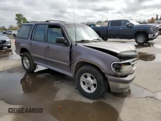 1996 Ford Explorer XL z VIN 1FMDU34X6TZB71667, wystawiony jako Copart lot #51969375 z przebiegiem 226 288 mil mil oraz Szkody całkowita. Historia ofert i sprzedaży dostępna na DreamBid. Obrazek 4.