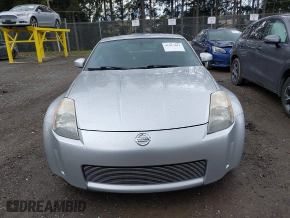 2004 Nissan 350Z Touring with VIN JN1AZ34E64T061197, listed as a IAAI auction lot 41917013 with 70,121 mi miles. Bid and sale history available at carsss.com. Image 12.
