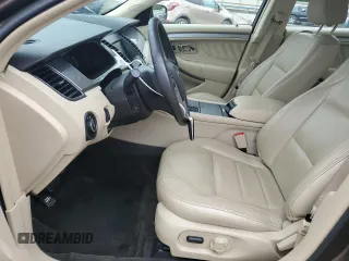2015 Ford Taurus SEL z VIN 1FAHP2E84FG102075, wystawiony jako Copart lot #59740265 z przebiegiem 90 669 mil mil oraz Szkoda całkowita • Salvage title. Historia ofert i sprzedaży dostępna na DreamBid. Obrazek 7.