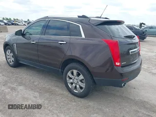 2015 Cadillac SRX Luxury Collection z VIN 3GYFNBE35FS597538, wystawiony jako IAAI lot #42056002 z przebiegiem 49 483 mil mil oraz . Historia ofert i sprzedaży dostępna na DreamBid. Obrazek 3.