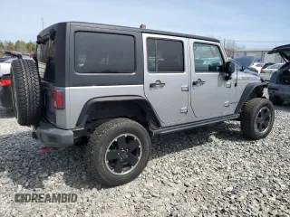 2015 Jeep Wrangler Unlimited Rubicon Hard Rock with VIN 1C4HJWFG4FL575054, listed as a Copart auction lot 51672655 with 130,405 mi miles and Clean title. Bid and sale history available at DreamBid. Image 3.