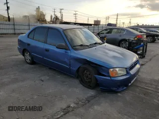 2001 Hyundai Accent GL with VIN KMHCG45C91U195735, listed as a Copart auction lot 80950554 with 164,176 mi miles and Salvage Title. Bid and sale history available at carsss.com. Image 4.