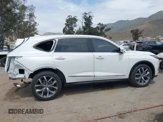 2022 Acura MDX w/Technology Package with VIN 5J8YD9H48NL009409, listed as a IAAI auction lot 42025333 with 21,889 mi miles. Bid and sale history available at carsss.com. Image 13.