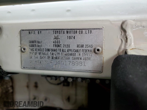 1974 Toyota Land Cruiser z VIN FJ40178981, wystawiony jako Copart lot #74798404 z przebiegiem 31 601 mil mil oraz Czysty tytuł • Clean title. Historia ofert i sprzedaży dostępna na DreamBid. Obrazek 12.
