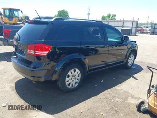 2017 Dodge Journey SE with VIN 3C4PDCAB9HT562563, listed as a IAAI auction lot 42113181 with 86,136 mi miles and . Bid and sale history available at DreamBid. Image 4.