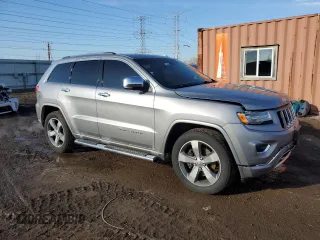 2015 Jeep Grand Cherokee Overland with VIN 1C4RJFCT8FC619014, listed as a Copart auction lot 44304375 with 123,767 mi miles and Salvage Title. Bid and sale history available at carsss.com. Image 4.