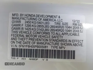 2023 Honda Passport Elite with VIN 5FNYF8H05PB005081, listed as a IAAI auction lot 41698186 with 31,853 mi miles and . Bid and sale history available at DreamBid. Image 9.