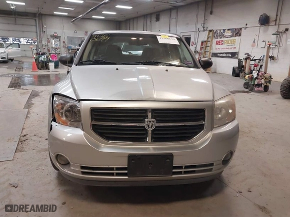 2007 Dodge Caliber SXT with VIN 1B3HB48B07D513778, listed as a IAAI auction lot 41260699 with NaN miles. Bid and sale history available at carsss.com. Image 18.