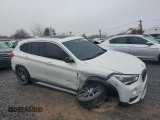 2016 BMW X1 xDrive28i with VIN WBXHT3C36GP881275, listed as a Copart auction lot 49181055 with 129,469 mi miles and Salvage Title. Bid and sale history available at carsss.com. Image 4.