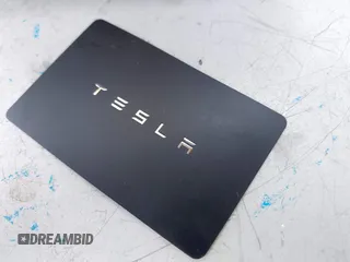 2018 Tesla Model 3 Long Range Battery z VIN 5YJ3E1EA2JF039262, wystawiony jako IAAI lot #42463443 z przebiegiem 77 482 mil mil oraz . Historia ofert i sprzedaży dostępna na DreamBid. Obrazek 11.