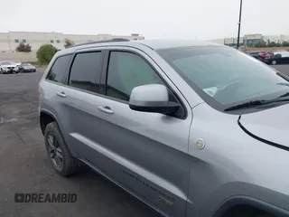 2016 Jeep Grand Cherokee Laredo z VIN 1C4RJFAG3GC457431, wystawiony jako IAAI lot #41993167 z przebiegiem 61 427 mil mil oraz . Historia ofert i sprzedaży dostępna na DreamBid. Obrazek 13.