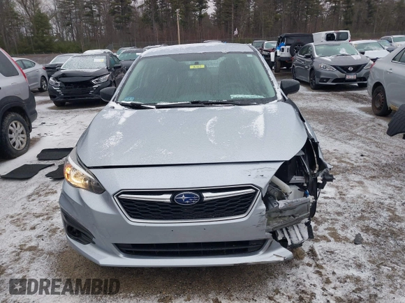 2019 Subaru Impreza with VIN 4S3GKAA60K3601427, listed as a IAAI auction lot 41845403 with 59,373 mi miles and . Bid and sale history available at DreamBid. Image 6.