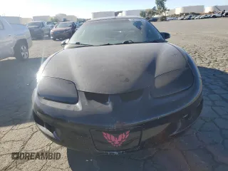 1999 Pontiac Firebird Firebird z VIN 2G2FS22K6X2208489, wystawiony jako Copart lot #79930994 z przebiegiem 181 964 mil mil oraz Czysty tytuł • Clean title. Historia ofert i sprzedaży dostępna na DreamBid. Obrazek 5.