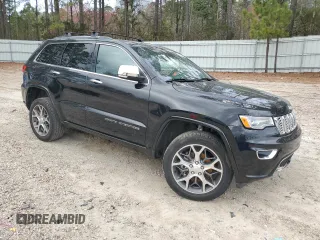 2020 Jeep Grand Cherokee Overland with VIN 1C4RJFCG6LC239331, listed as a Copart auction lot 45449465 with 62,487 mi miles and Salvage Title. Bid and sale history available at carsss.com. Image 4.