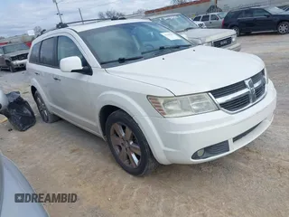 2009 Dodge Journey R/T with VIN 3D4GH67V99T169786, listed as a IAAI auction lot 41708329 with 131,556 mi miles. Bid and sale history available at carsss.com. Image 1.