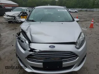 2015 Ford Fiesta SE z VIN 3FADP4EJ2FM200721, wystawiony jako Copart lot #58265735 z przebiegiem Nie podano mil oraz Tytuł czysty. Historia ofert i sprzedaży dostępna na DreamBid. Obrazek 5.