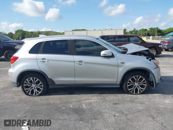2018 Mitsubishi Outlander SE with VIN JA4AP3AW7JU002904, listed as a IAAI auction lot 42308738 with 65,259 mi miles and . Bid and sale history available at DreamBid. Image 13.