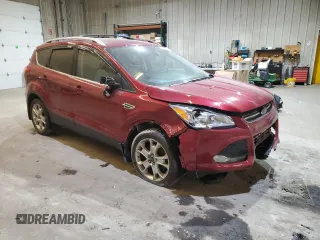 2016 Ford Escape Titanium with VIN 1FMCU9J93GUB50010, listed as a Copart auction lot 85887364 with 36,333 mi miles and Salvage Title. Bid and sale history available at DreamBid. Image 4.