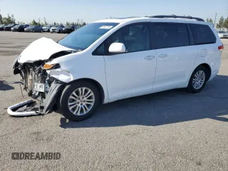2013 Toyota Sienna XLE AAS with VIN 5TDYK3DC5DS322039, listed as a Copart auction lot 61657715 with 185,269 mi miles and Salvage title. Bid and sale history available at DreamBid. Image 1.